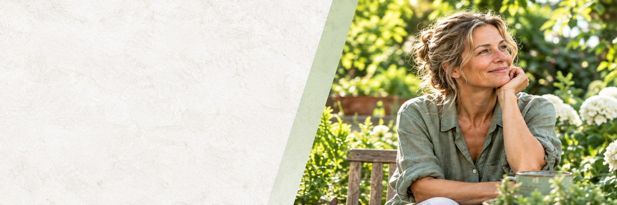 Woman enjoying a quiet moment in a sunlit garden